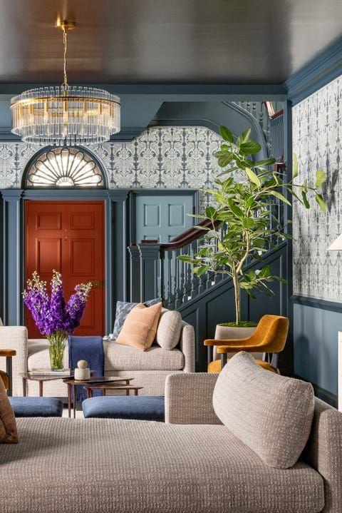 New, stylish great use of blue, grey and rust accent. Wallpaper is great! 